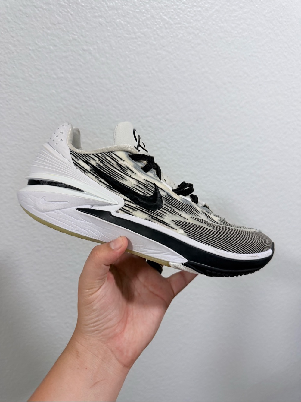 Nike gt white and black shoes